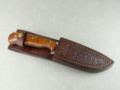 W41 inserted into handmade brown leather sheath